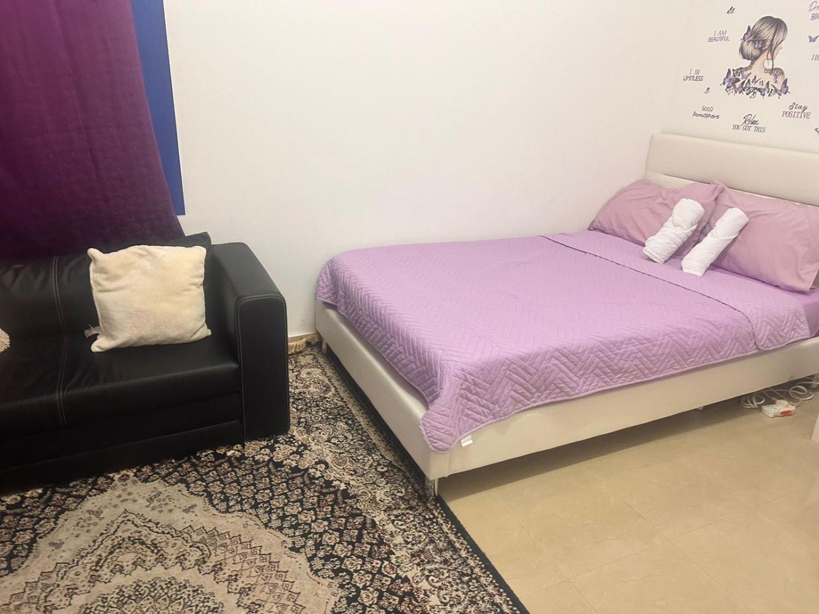 The Purple Place Apartment Абу Даби Екстериор снимка