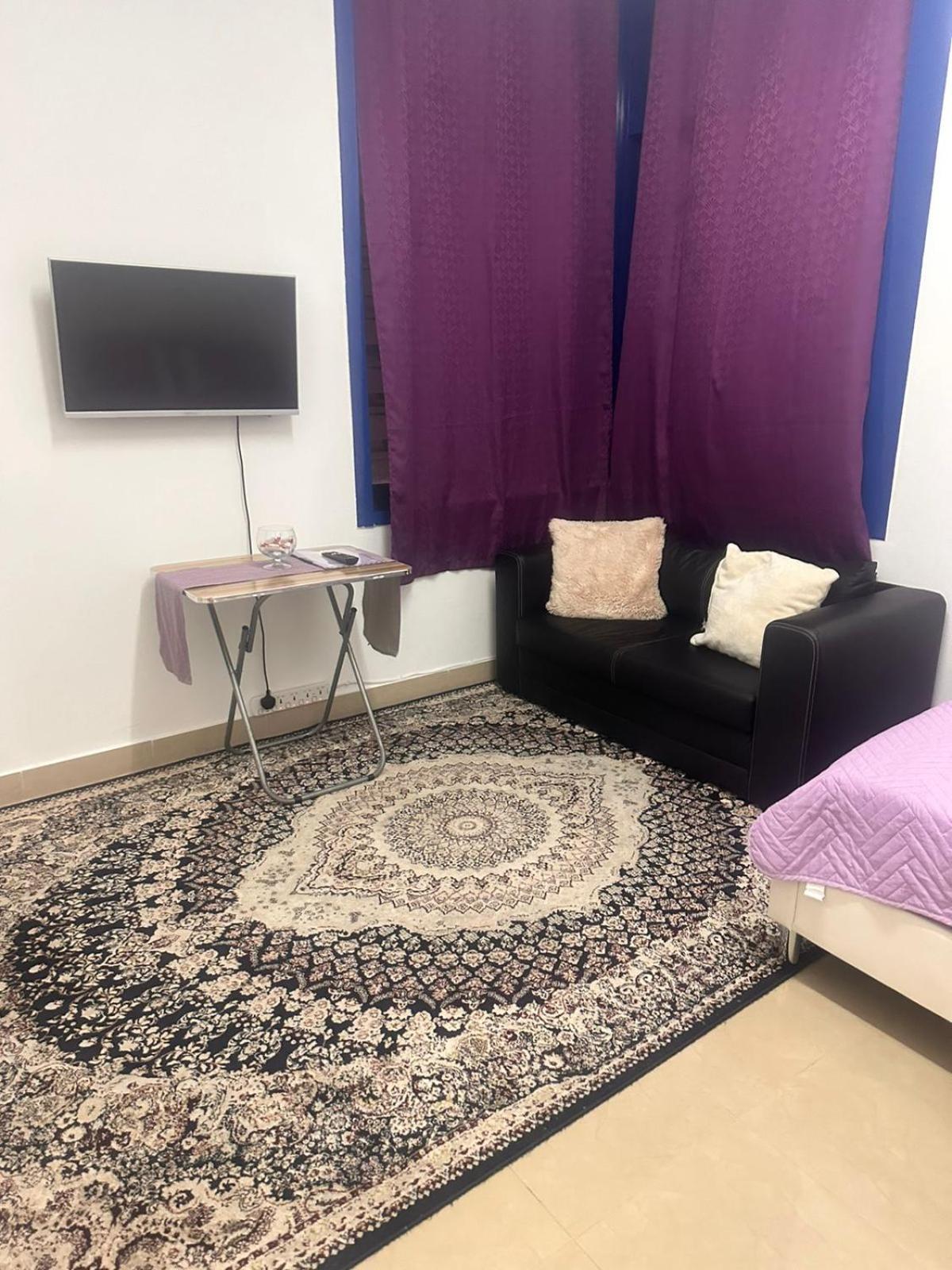 The Purple Place Apartment Абу Даби Екстериор снимка